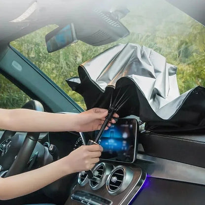 Folded car sun shade umbrella stored in a premium leather pouch for portability.
