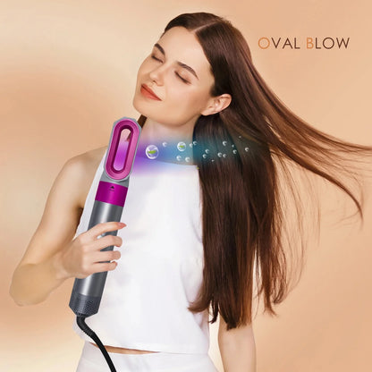 Model using the smoothing brush attachment to achieve straight and frizz-free hair.